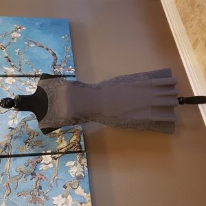 Elle grey dress with lace detail.